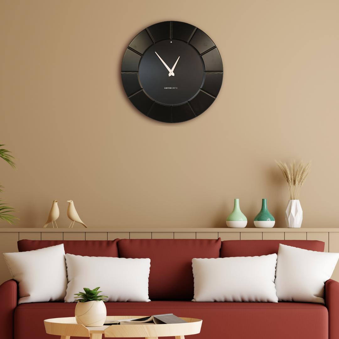 Black HDMR wall clock displayed